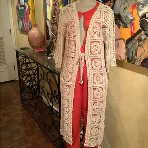 Tie front crochet maxi cardigan.